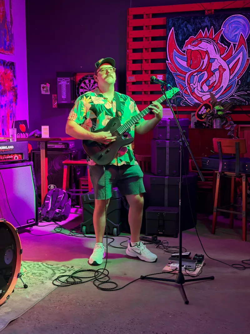 Sod The Earth live under pink stage light